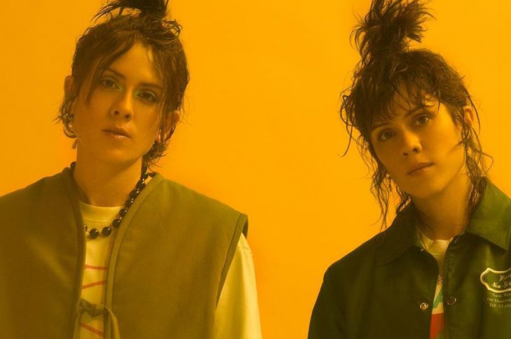 Yellow-tinted picture of Tegan and Sara