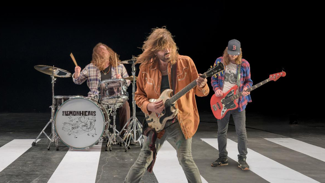 three musicians performing live