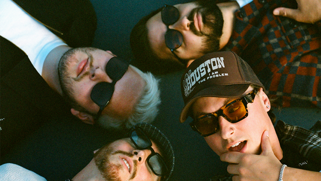 Four men photographed from above.
