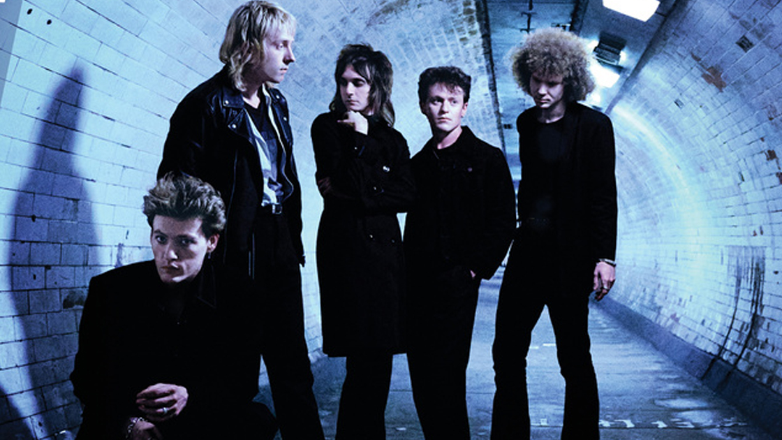 Five men photographed in underground tunnel