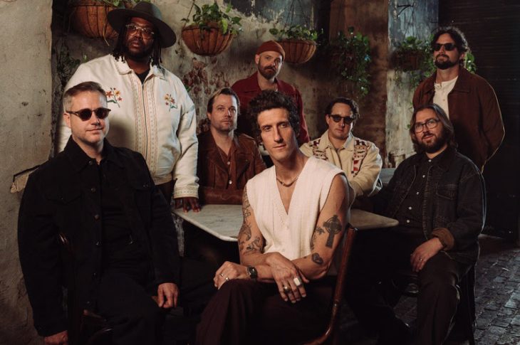 Photo of 8 people sittting at table